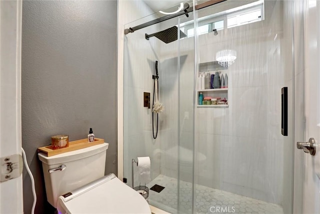 1610 Via Roma Cir, Corona, CA 92881 - full bathroom featuring a textured wall, toilet, and a stall shower