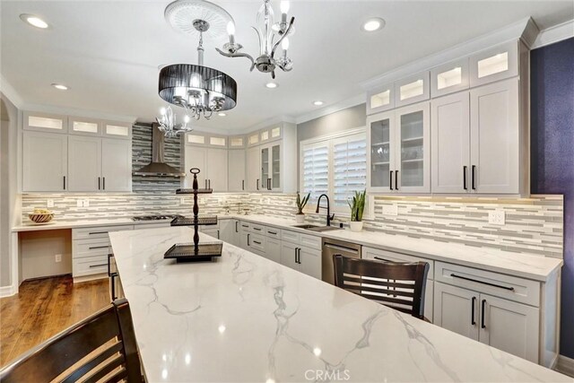 1610 Via Roma Cir, Corona, CA 92881 - kitchen with a chandelier, wall chimney range hood, recessed lighting, and a sink