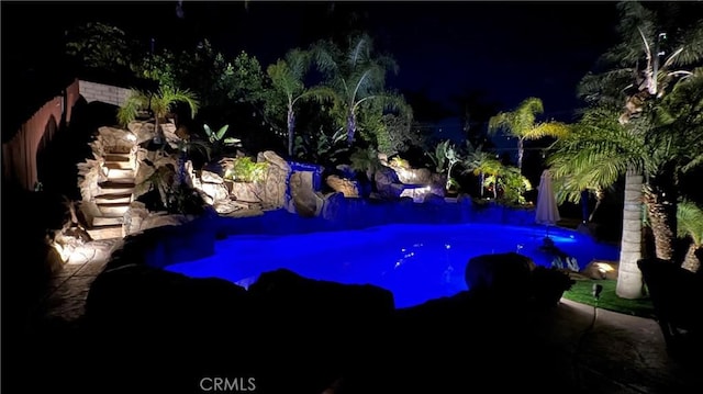 1610 Via Roma Cir, Corona, CA 92881 - pool at twilight featuring an outdoor pool
