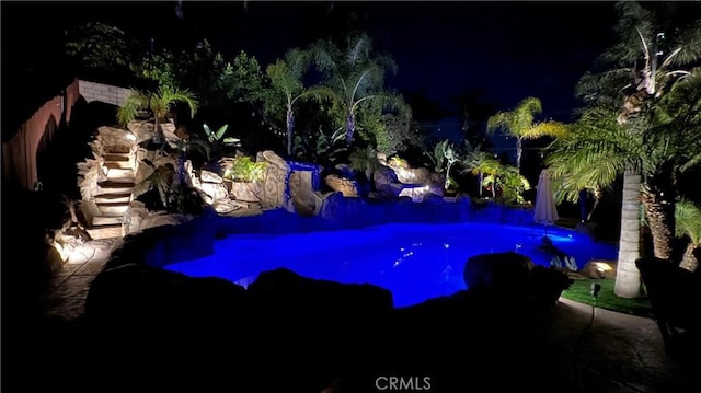 1610 Via Roma Cir, Corona, CA 92881 - pool at night with an outdoor pool