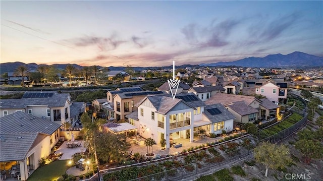 aerial view featuring a residential view and a mountain view