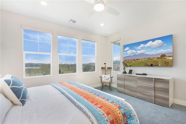carpeted bedroom with visible vents, a ceiling fan, baseboards, and recessed lighting