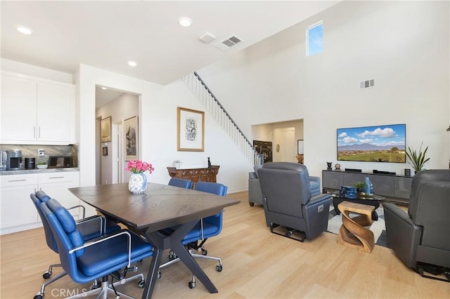 home office featuring recessed lighting, visible vents, and light wood finished floors