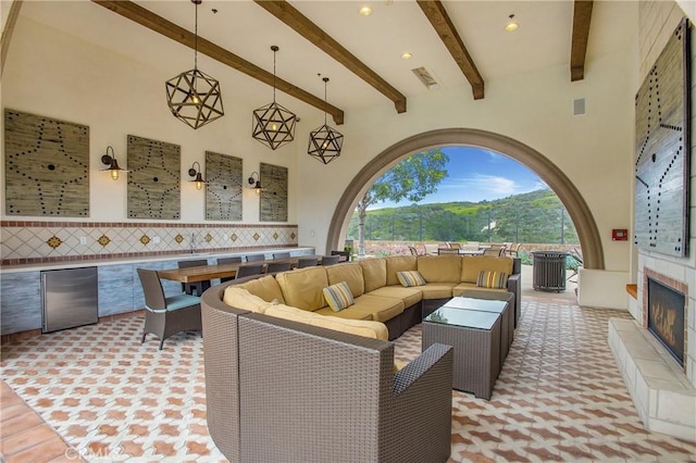 view of patio / terrace with an outdoor living space and visible vents