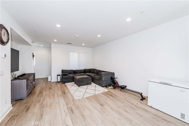 14161 Olivia Ct, La Mirada, CA 90638 - living area with light wood-style flooring and recessed lighting