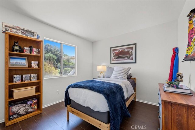 11891 Ramsdell Ct, San Diego, CA 92131 - bedroom featuring baseboards and dark wood-style flooring