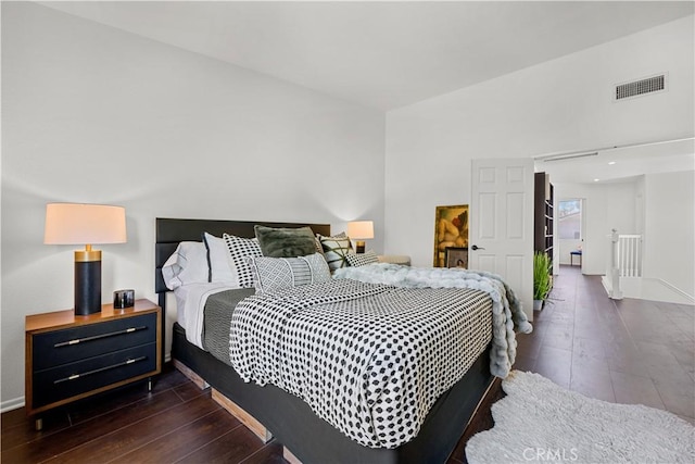 11891 Ramsdell Ct, San Diego, CA 92131 - bedroom featuring baseboards, visible vents, and dark wood-type flooring