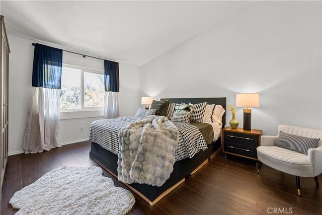 11891 Ramsdell Ct, San Diego, CA 92131 - bedroom with baseboards, vaulted ceiling, and hardwood / wood-style flooring