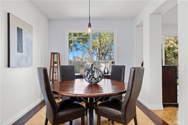 11891 Ramsdell Ct, San Diego, CA 92131 - dining space with baseboards and wood finished floors