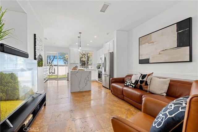 11891 Ramsdell Ct, San Diego, CA 92131 - living area with visible vents and recessed lighting