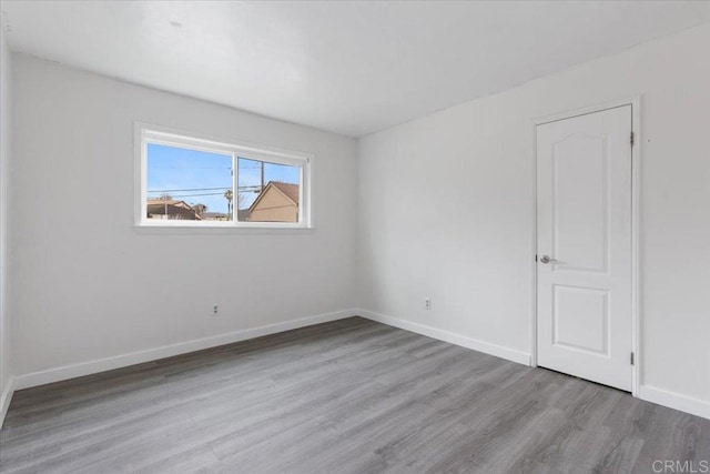 455 Ballantyne St Unit 20, El Cajon, CA 92020 - spare room featuring wood finished floors and baseboards