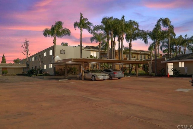 455 Ballantyne St Unit 20, El Cajon, CA 92020 - property at dusk with covered and uncovered parking