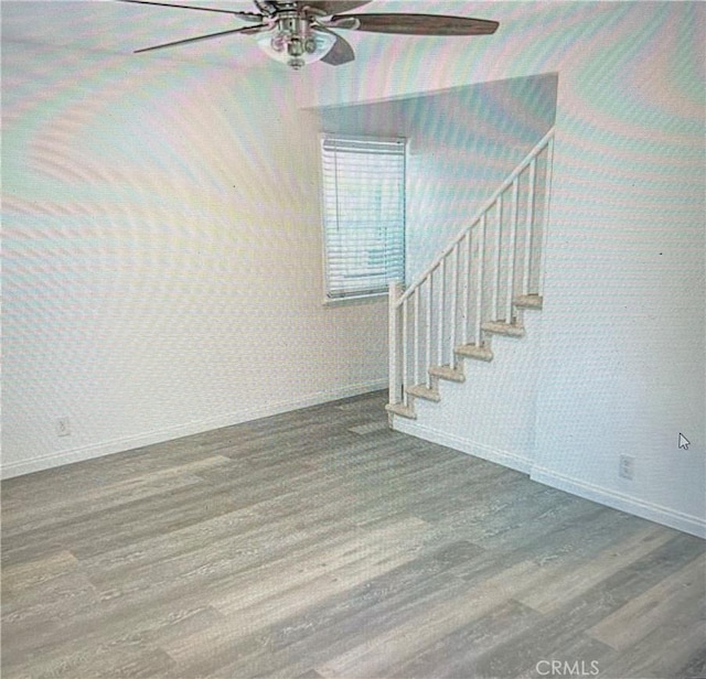 258 Glendora Ave, Long Beach, CA 90803 - staircase with baseboards, wallpapered walls, ceiling fan, and wood finished floors