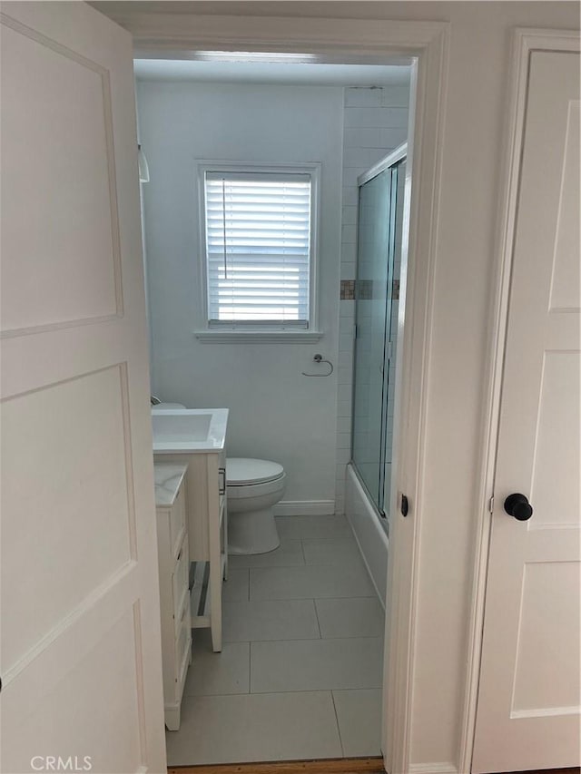 258 Glendora Ave, Long Beach, CA 90803 - full bath with vanity, toilet, tile patterned flooring, and enclosed tub / shower combo