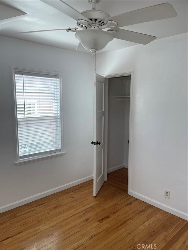 258 Glendora Ave, Long Beach, CA 90803 - unfurnished bedroom featuring a ceiling fan, light wood-style floors, a closet, and baseboards