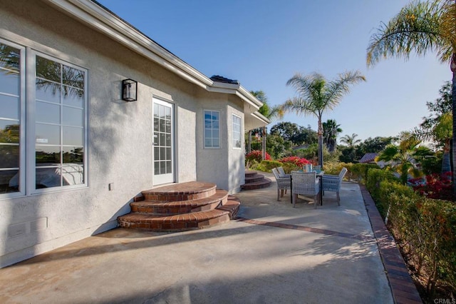 view of patio with outdoor dining space