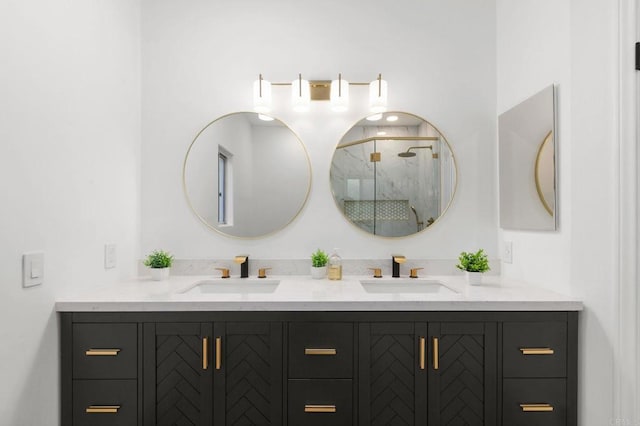 full bathroom with double vanity, a sink, and a shower stall