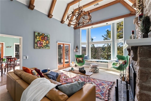 28019 N Shore Rd, Lake Arrowhead, CA 92352 - living area featuring high vaulted ceiling, a chandelier, a stone fireplace, beamed ceiling, and carpet flooring