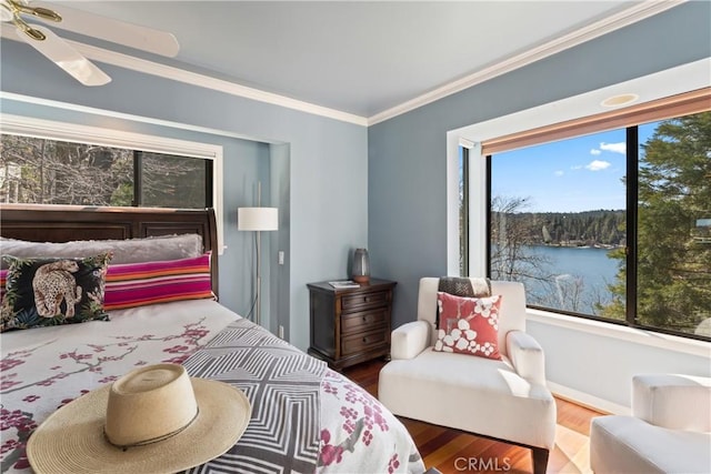 28019 N Shore Rd, Lake Arrowhead, CA 92352 - bedroom with ornamental molding, wood finished floors, and a water view