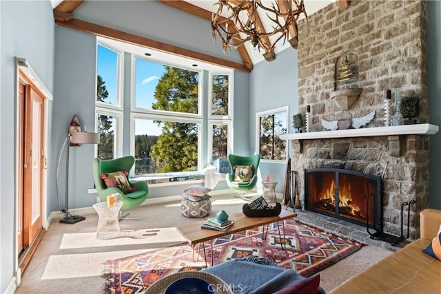 28019 N Shore Rd, Lake Arrowhead, CA 92352 - living room with a towering ceiling, a chandelier, a stone fireplace, carpet flooring, and beamed ceiling