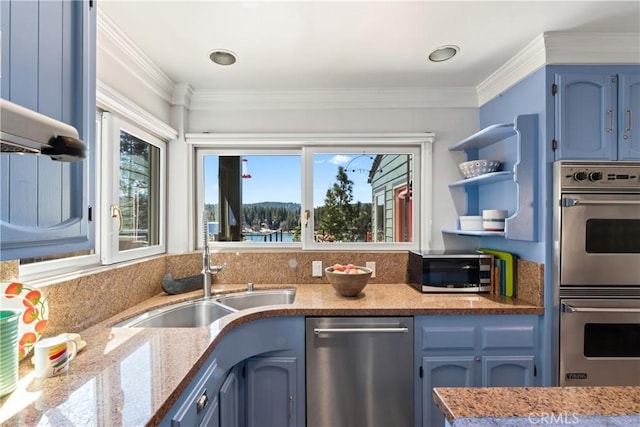 28019 N Shore Rd, Lake Arrowhead, CA 92352 - kitchen featuring stainless steel appliances, blue cabinetry, ornamental molding, and light stone countertops