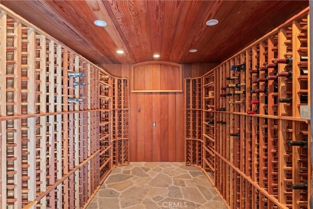 28019 N Shore Rd, Lake Arrowhead, CA 92352 - wine area with stone flooring, recessed lighting, and wooden ceiling