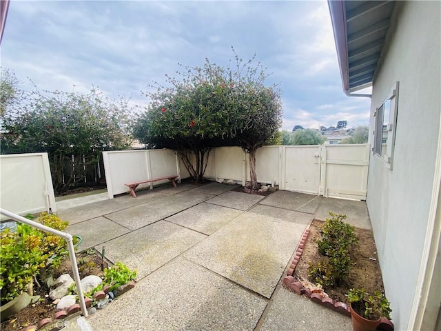 view of patio / terrace featuring a gate and a fenced backyard