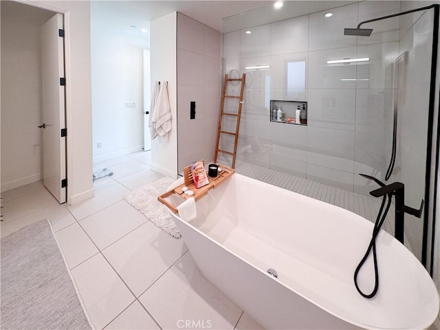 57601 Santo Thomas Ln, Quinta, CA 92253 - full bathroom with tile patterned floors, recessed lighting, baseboards, a soaking tub, and walk in shower
