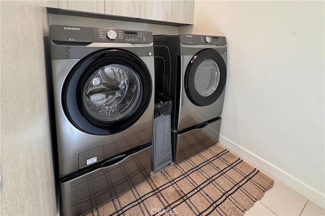57601 Santo Thomas Ln, Quinta, CA 92253 - washroom with laundry area, washing machine and dryer, and baseboards