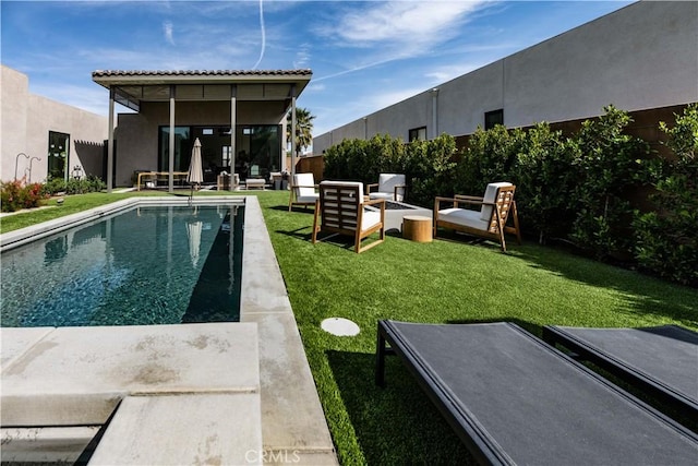57601 Santo Thomas Ln, Quinta, CA 92253 - outdoor pool featuring an outdoor living space, a lawn, and fence private yard