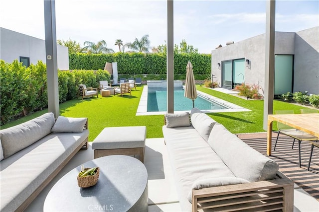 view of patio featuring a fenced in pool and an outdoor hangout area