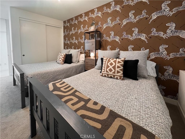 57601 Santo Thomas Ln, Quinta, CA 92253 - bedroom featuring a closet, carpet, and wallpapered walls