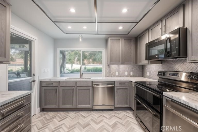 1021 Pebble Beach Dr, Upland, CA 91784 - kitchen with black appliances, a sink, recessed lighting, decorative backsplash, and gray cabinets