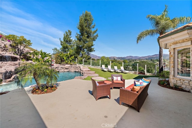 6 Via Presea, Coto De Caza, CA 92679 - view of patio / terrace featuring a mountain view, an outdoor hangout area, and an outdoor pool