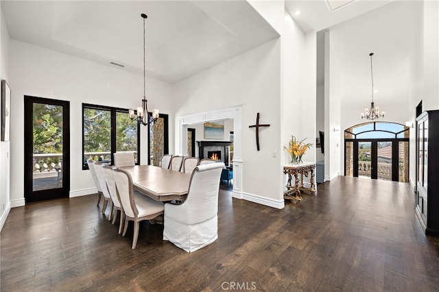 6 Via Presea, Coto De Caza, CA 92679 - dining room with a chandelier, healthy amount of natural light, a high ceiling, and dark wood-style floors