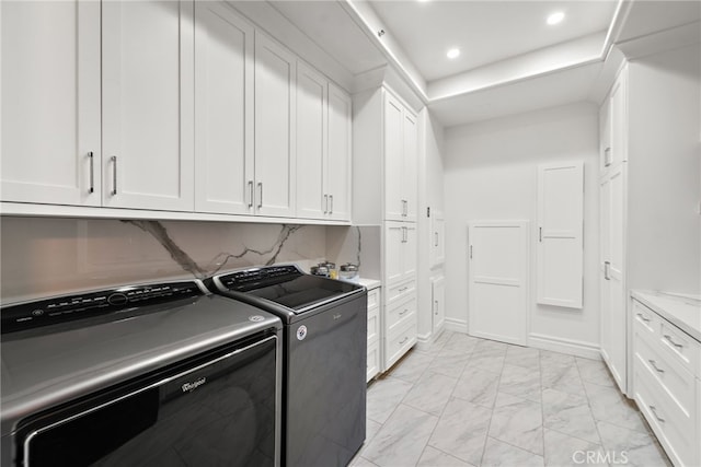 6 Via Presea, Coto De Caza, CA 92679 - laundry area with light marble finish flooring, washing machine and clothes dryer, cabinet space, and recessed lighting
