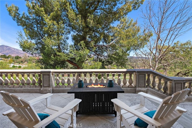 6 Via Presea, Coto De Caza, CA 92679 - wooden terrace featuring an outdoor fire pit, a mountain view, and a patio area