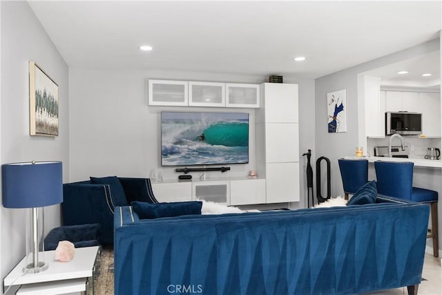 living room featuring recessed lighting