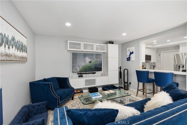 living area featuring recessed lighting