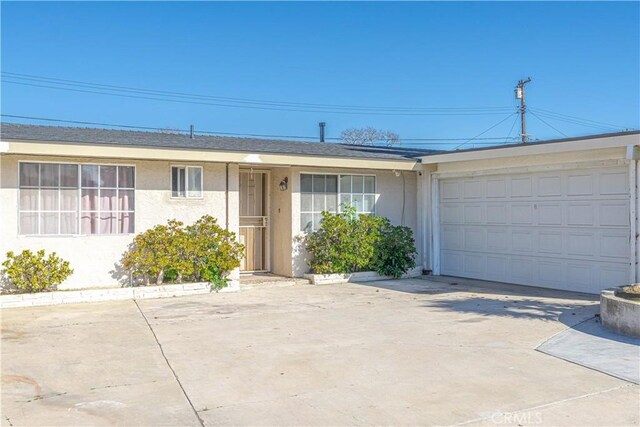 13602 Lanning St, Garden Grove, CA 92843 - single story home with stucco siding, concrete driveway, and a garage