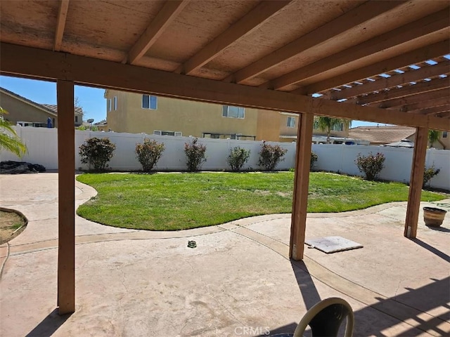 view of patio / terrace with a pergola and a fenced backyard