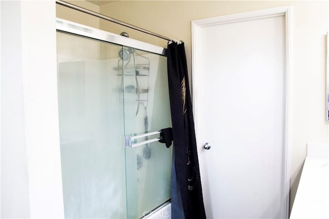 bathroom with a stall shower