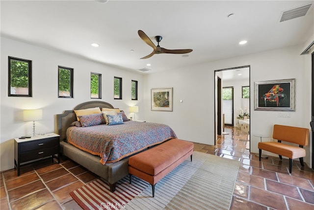 bedroom with a ceiling fan, visible vents, and recessed lighting