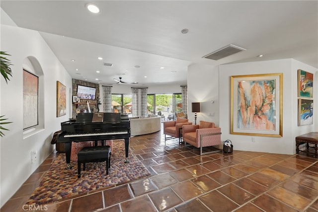 sitting room featuring visible vents, recessed lighting, and ceiling fan