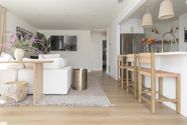 184246 S Pacific St, Oceanside, CA 92054 - living room with light wood-style floors