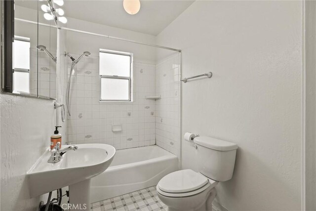 2909 Carlene Pl, Chico, CA 95973 - full bathroom with toilet, tile patterned floors, and washtub / shower combination