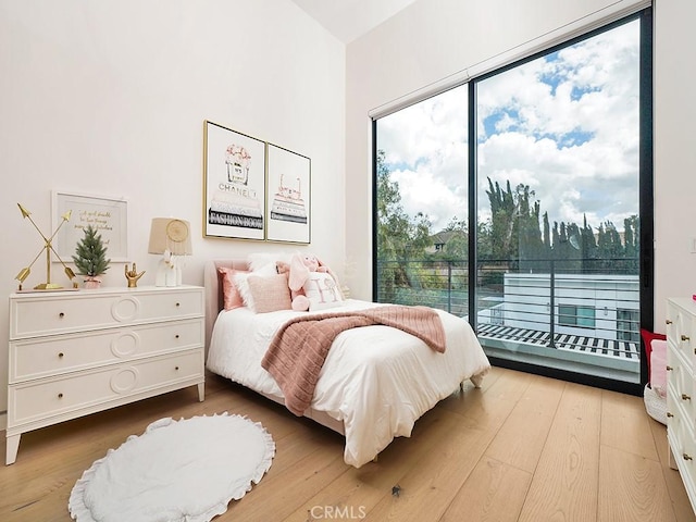 18852 Canyon Crest Dr, Villa Park, CA 92861 - bedroom with access to exterior and wood finished floors