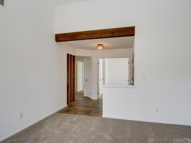 1714 Woodlark Ln, Fallbrook, CA 92028 - unfurnished room with beamed ceiling, carpet, and baseboards