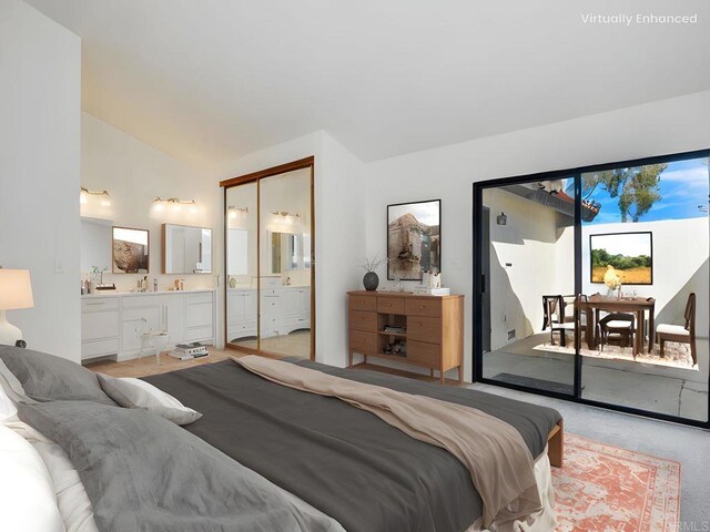 1714 Woodlark Ln, Fallbrook, CA 92028 - bedroom with vaulted ceiling, ensuite bathroom, light colored carpet, and access to exterior