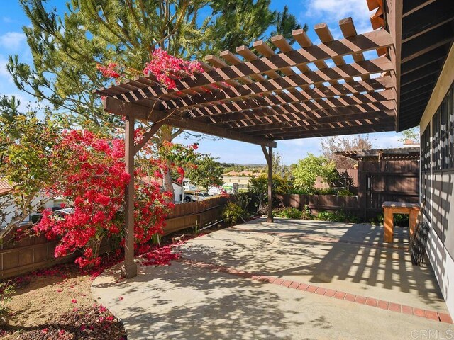 1714 Woodlark Ln, Fallbrook, CA 92028 - fenced backyard featuring a patio area and a pergola